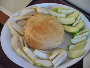 Baked brie with pepper jelly, pears, apples