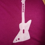 Guitar on the hip (I used regular fabric paint here, I figured the glitter wouldn't show the small bits well).